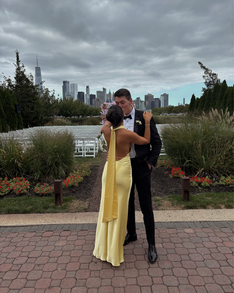 sau lee dress Yellow Gown by Sau Lee Perfect for radiating ethereal glow at celebratory soirees with poisted poise. SAU LEE Giselle Halter Maxi