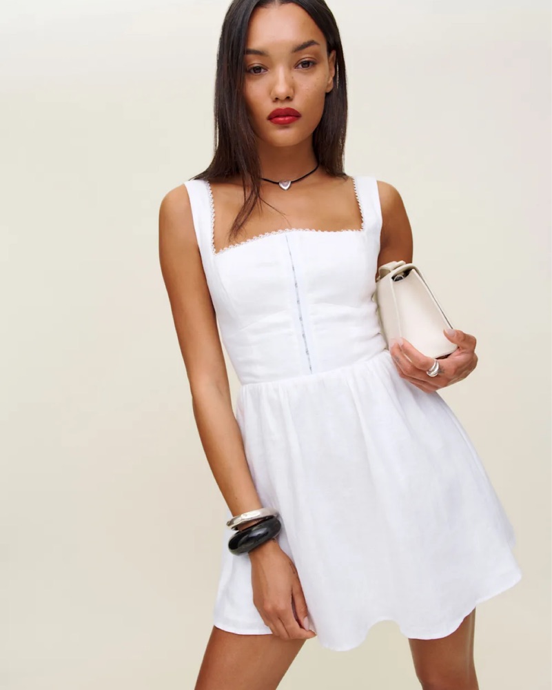 reformation white mini dress Size 4  Chic Consignment LLC Mini dresses A soothing floral print decorates this supercute fit White Christine Dress by Reformation