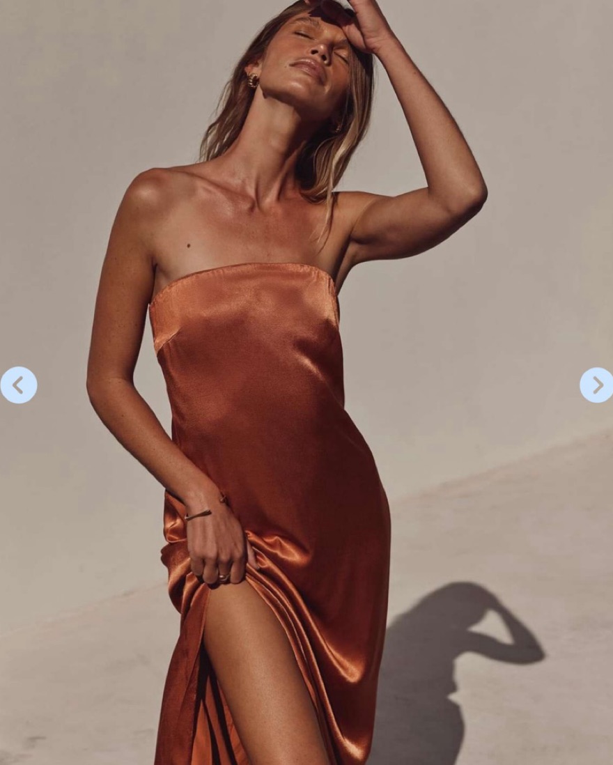 dissh orange dress New Season Linens  This is the Malik tangerine linen midi dress.   Designed with our signature ruching and exaggerated puff sleeves you know  and love.  Made from 100% linen.  
